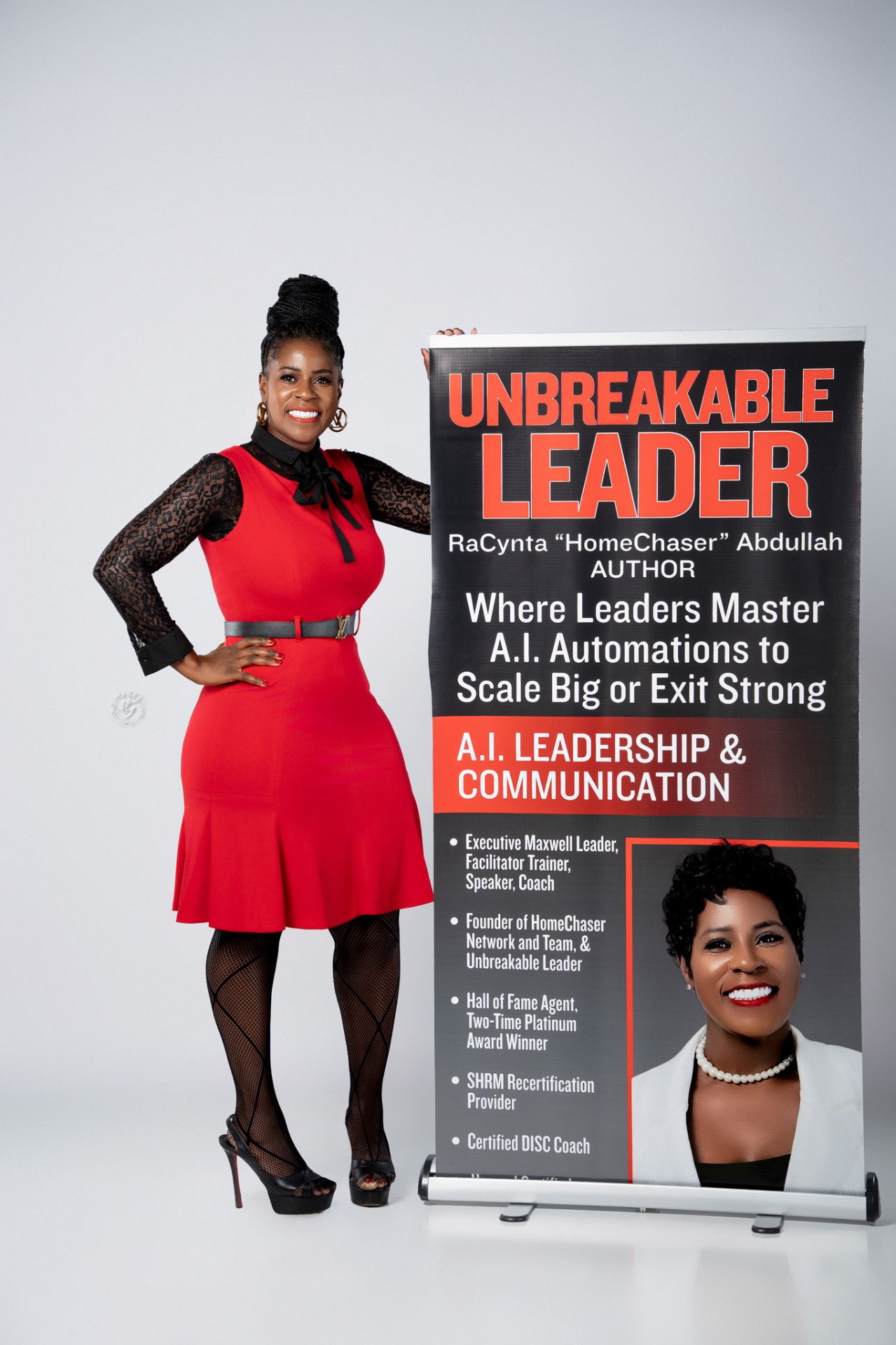 Racynta Abdullah with Unbreakable Leader banner